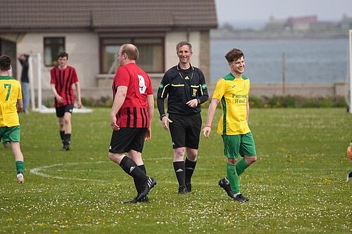 Liam McArthur refereeing the Westray v Stronsay match on Sunday 12th May, credit to Julian Preston.