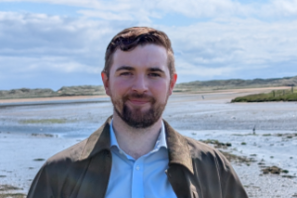 a headshot of David Evans