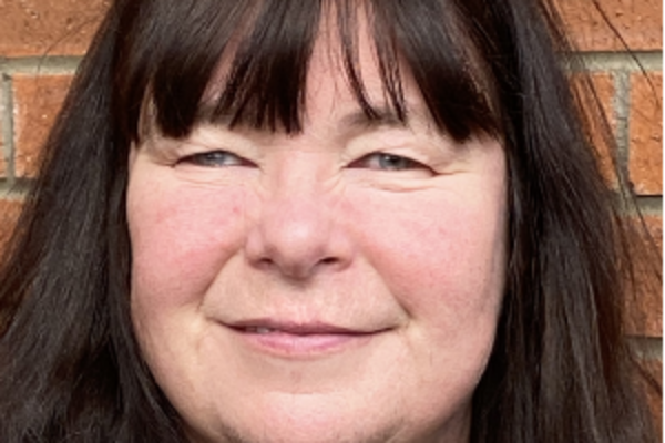 a headshot of Caron Lindsay