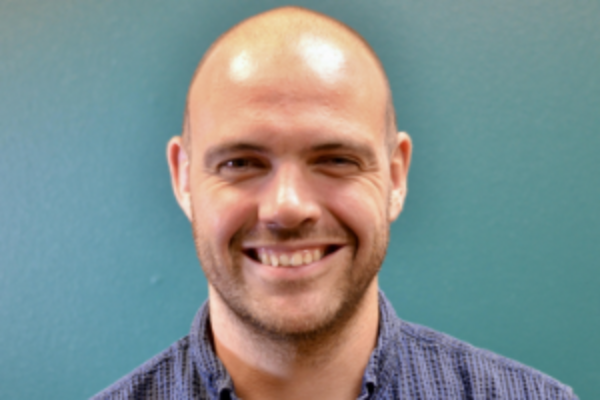 a headshot of andy williamson