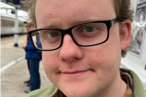 a headshot of Greg Foster