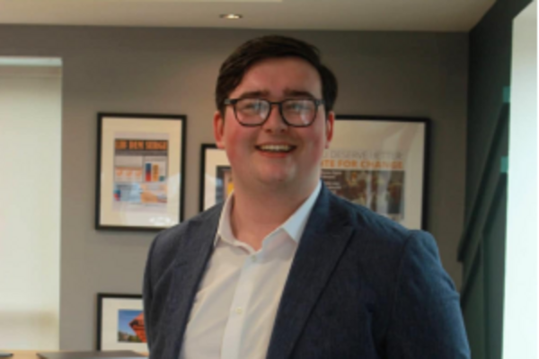 a headshot of Leo Dempster