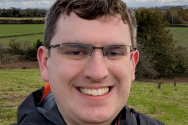 a headshot of Grant Toghill