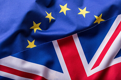 A flag consisting of half of the union jack and half of the EU flag.